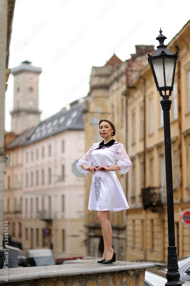 Fototapeta premium Cute girl posing on a city street