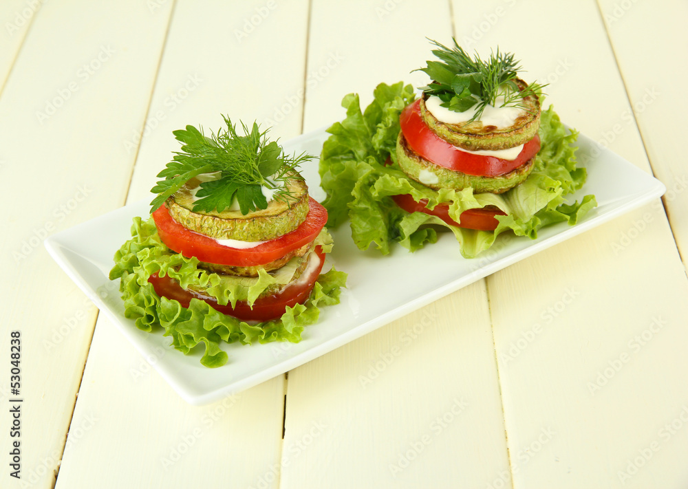Tasty roasted marrow and tomato slices with salad leaves, Tasty roasted marrow and tomato slices with salad leaves,