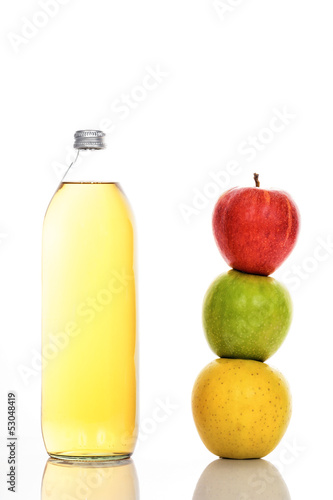 Apple juice in glass bottle