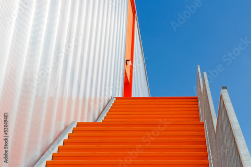 Down the orange emergency staircase
