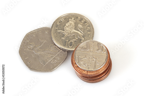 50p 10p 5p and 1p British coins stacked on white with natural shadows photo