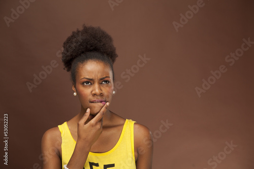 African American woman shows emotion with facial features