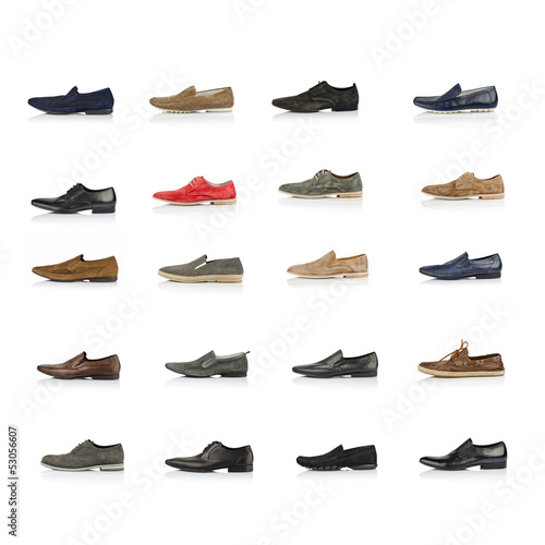 Large set of male shoes over white