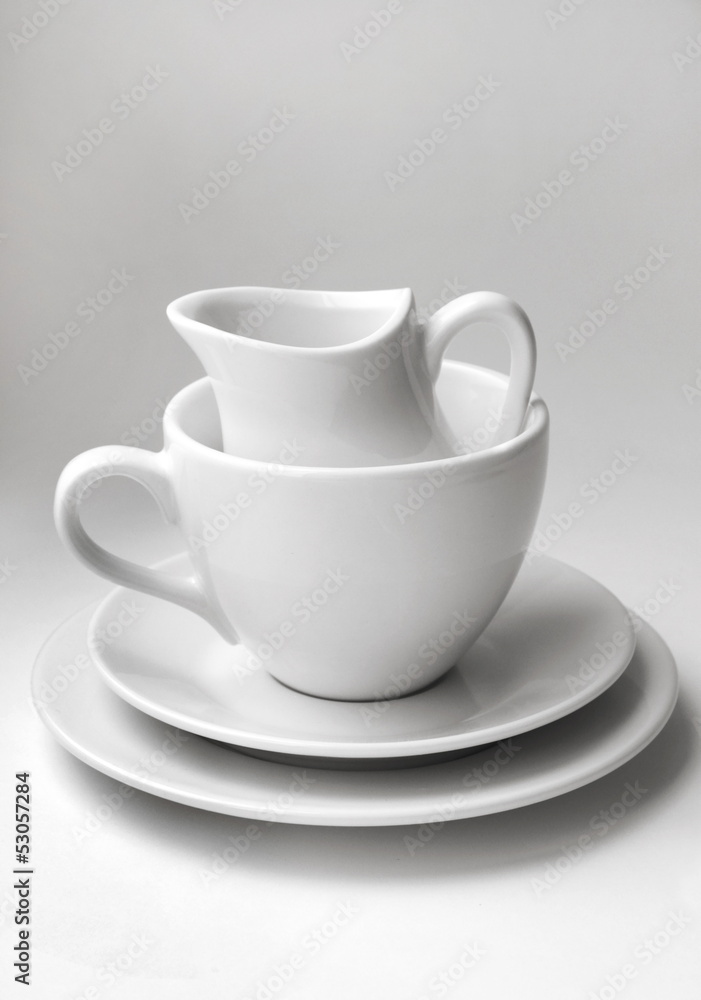 Stack of different clean white crockery Stack of different clean white crockery