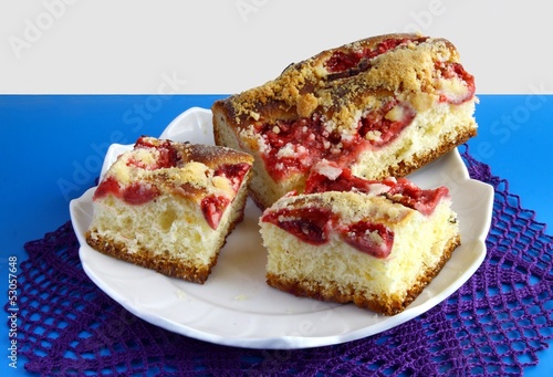 fruit cake with strawberries and crumb