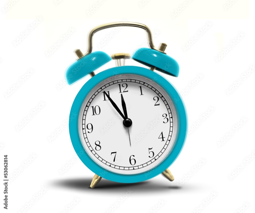 Alarm clock ringing over white Alarm clock ringing over white