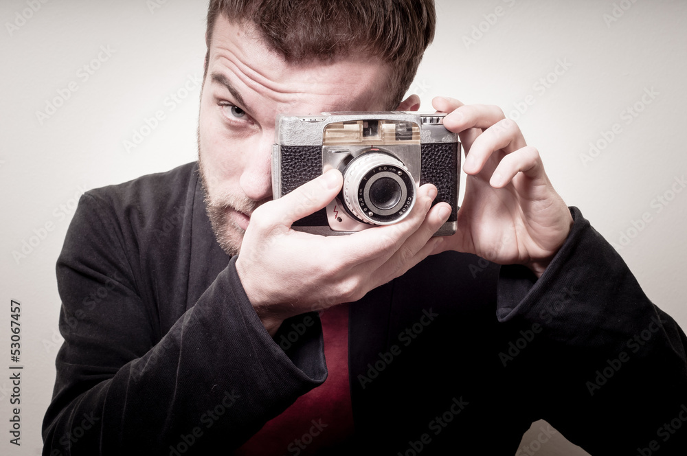 hipster stylish fashion man with old camera hipster stylish fashion man with old camera