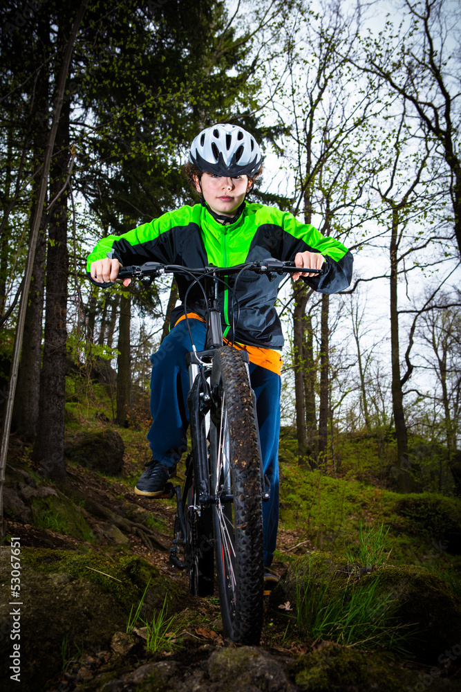 Naklejka premium Boy cycling