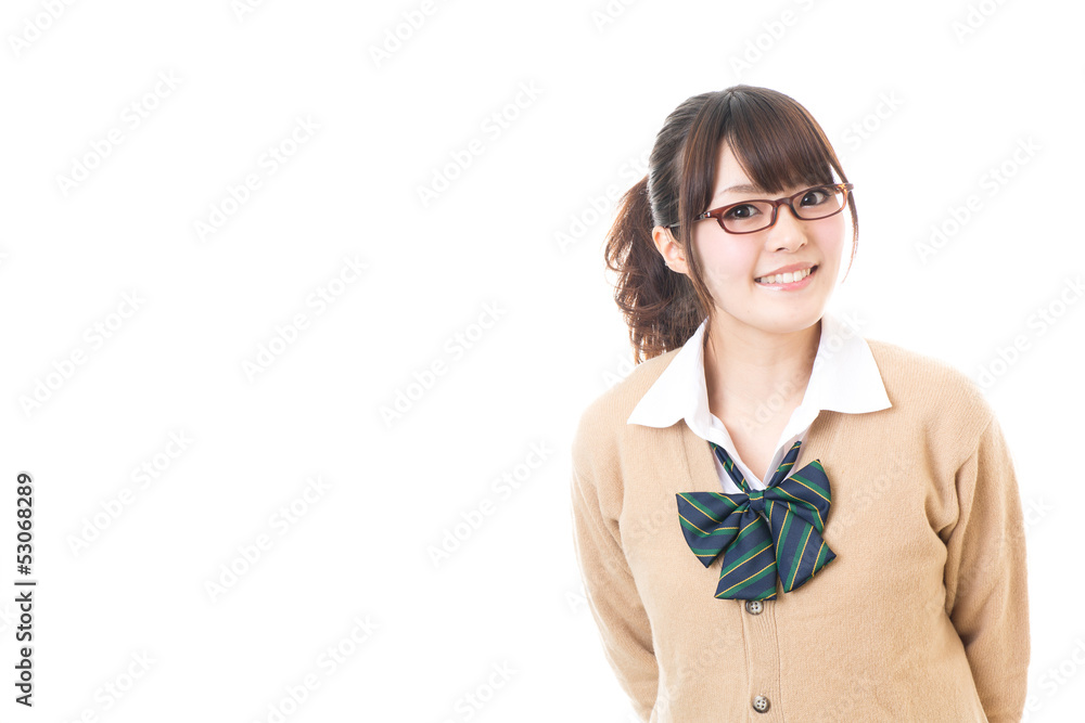 a young asian school girl on white background a young asian school girl on white background