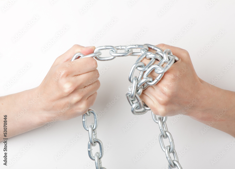 hands holding a chain. isolated on white background hands holding a chain. isolated on white background