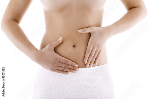 Woman massaging pain stomach isolated on white