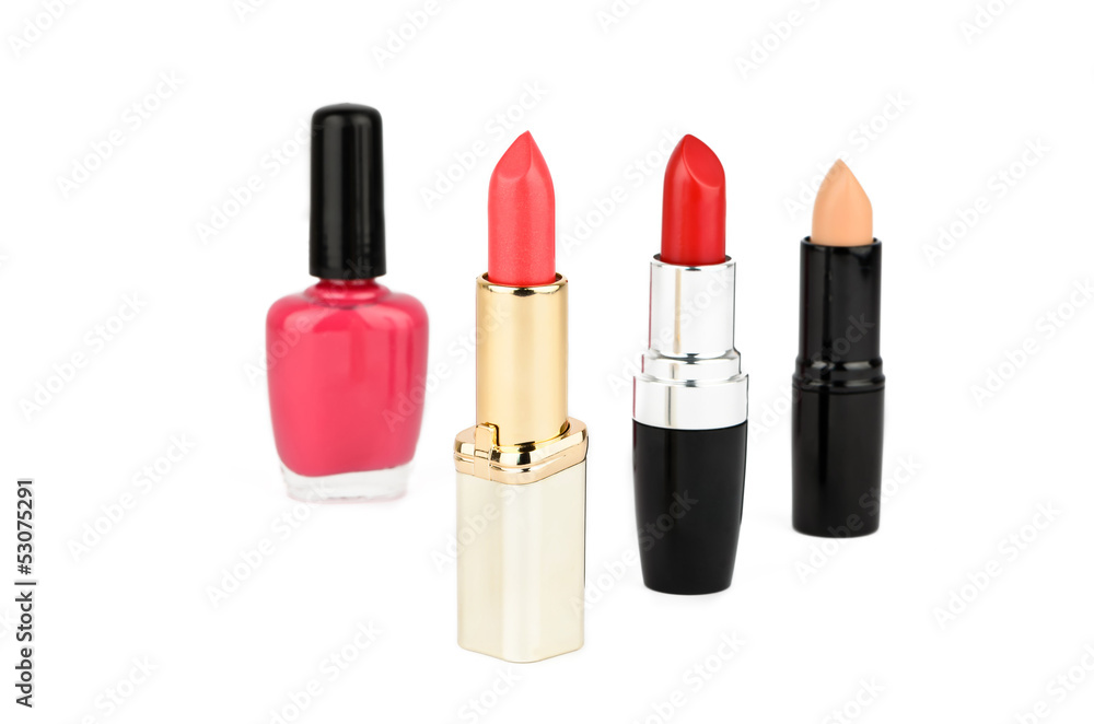 Three lipstick and a nail polish Three lipstick and a nail polish