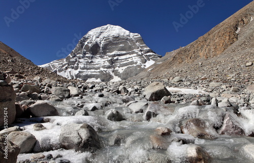 Holy Mount Kailash and river in Tibet