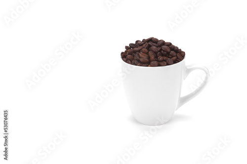 white cup coffee beans