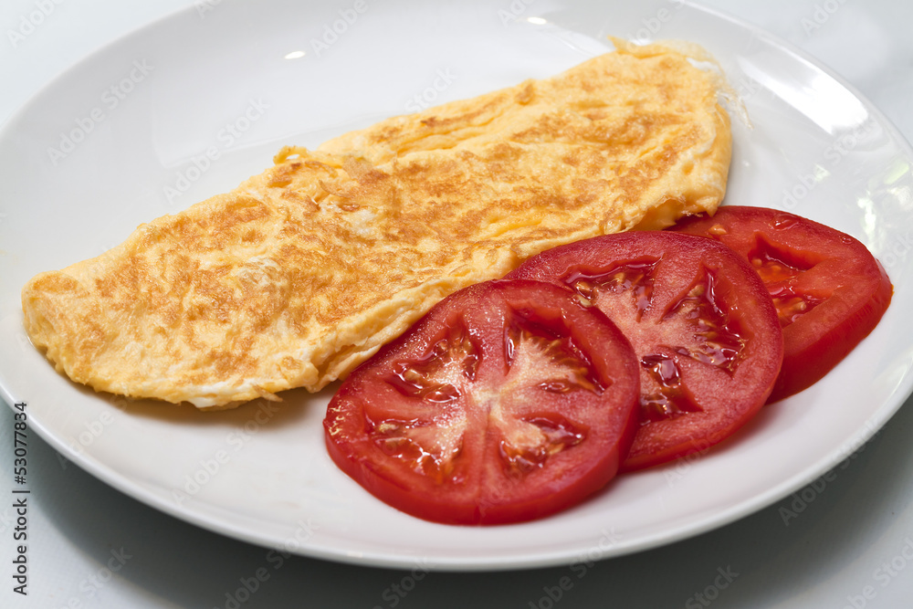 omelette with sliced tomato
