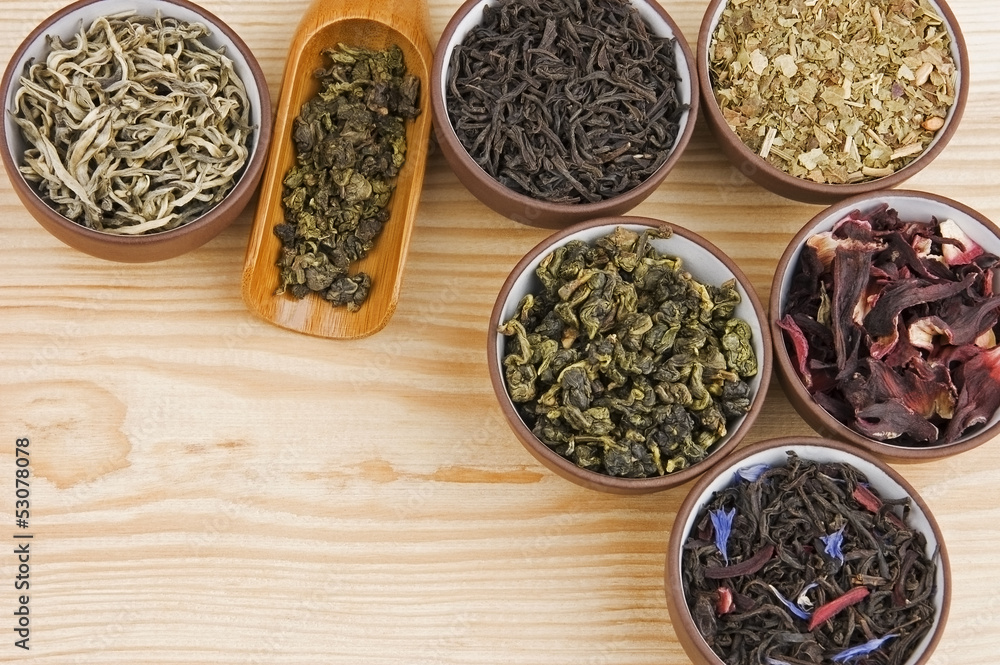 Assortment of dry tea in ceramic bowls Assortment of dry tea in ceramic bowls