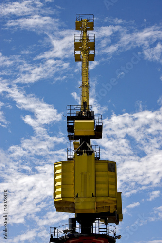 sky clouds and yellow crane in buenos aires