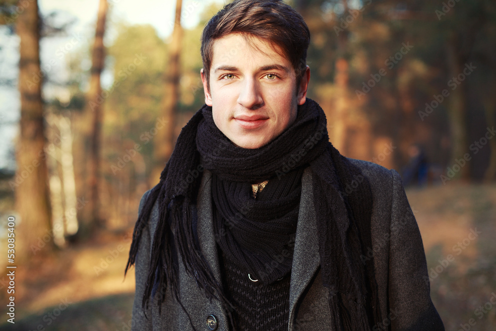 Young smiling man outdoor portrait Young smiling man outdoor portrait