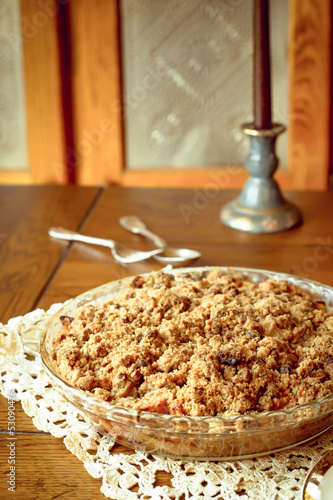 Canvas Print Crumb topped apple crisp dessert cooling by window