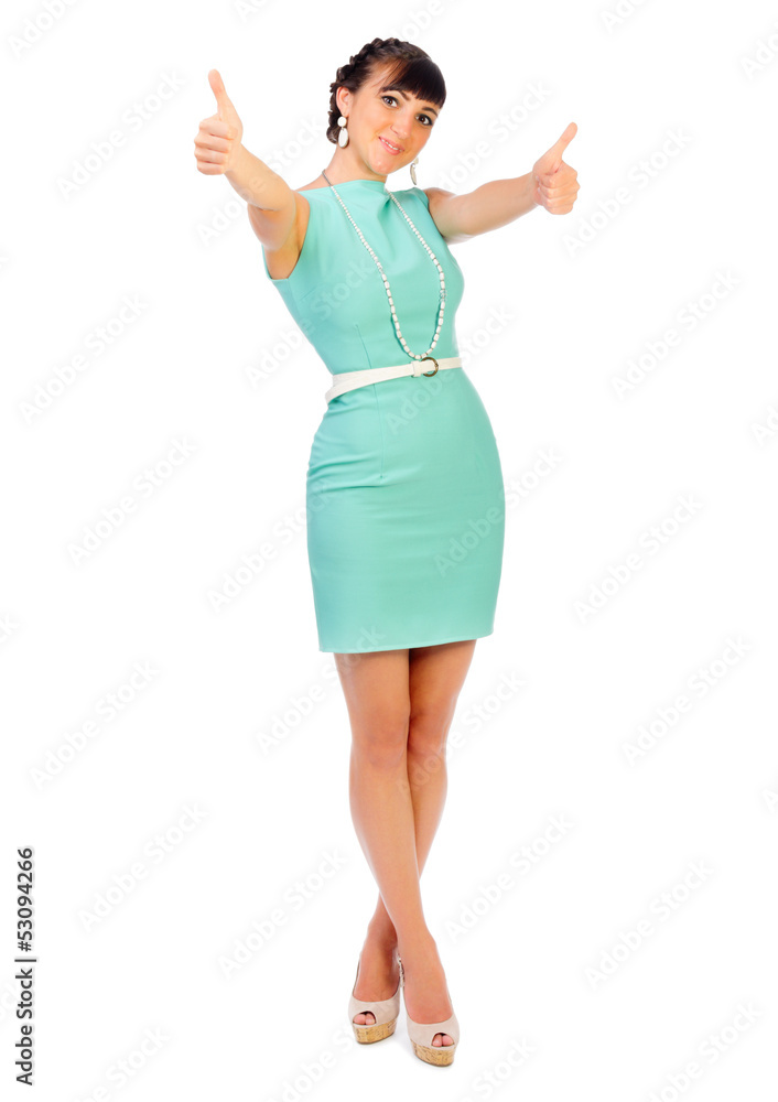 Glamorous girl in turquoise dress shows ok gesture Glamorous girl in turquoise dress shows ok gesture