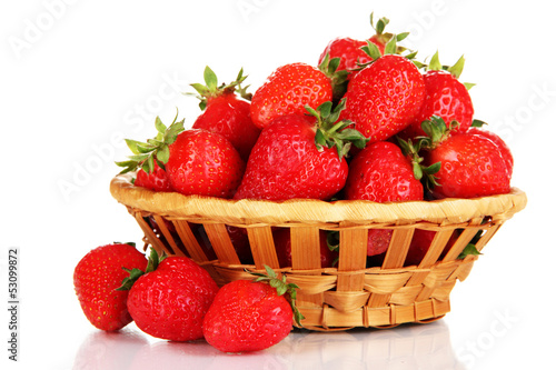 Fresh strawberry in wicker basket isolated on white