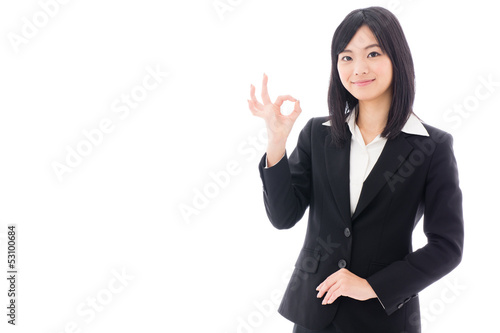 attractive asian businesswoman showing okay sign