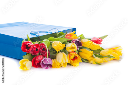 bouquet of tulip flowers in the blue bag