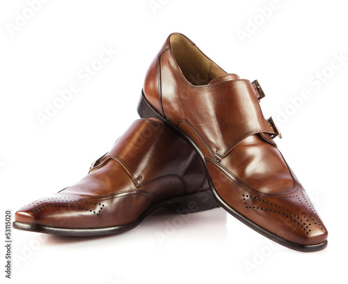 Brown man's shoes isolated on white background. Pair of brown m