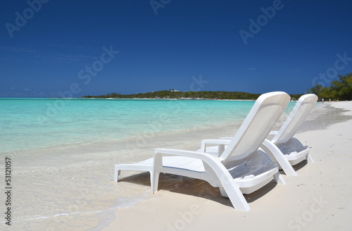 Two sunbeds overlooking Atlantic. Exuma, Bahamas