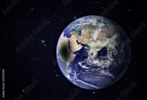 Fototapeta Naklejka Na Ścianę i Meble -  Moon shadow on Earth. Elements of this image furnished by NASA.