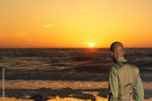 Portrait of an african american man looking at the sunset