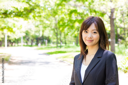 asian businesswoman in the park