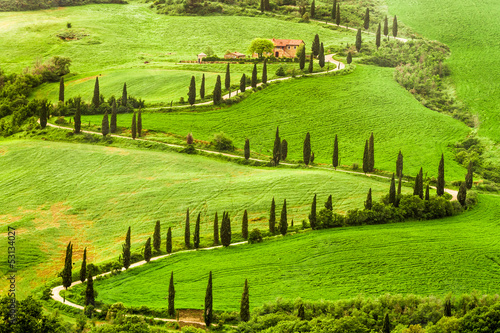 Winding road to agritourism in Italy on the hill