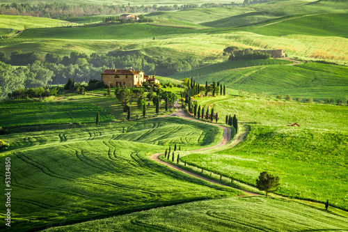 Farmhouse in Tuscany located on a hill