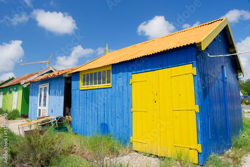 Colorful wooden cabins © MartinW