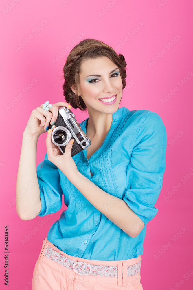 Cute retro young woman with analogue camera Cute retro young woman with analogue camera