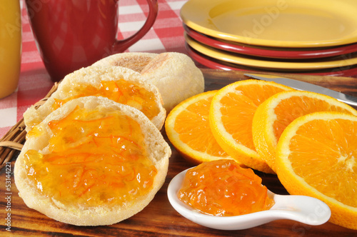Orange marmalade on an English muffin photo