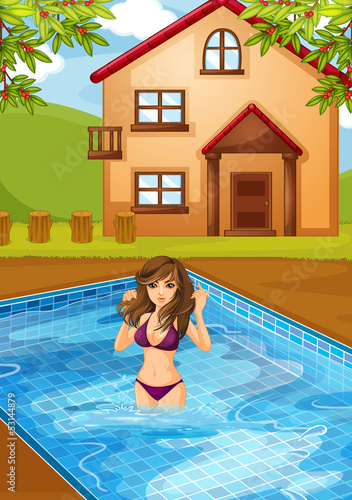A sexy girl at the swimming pool