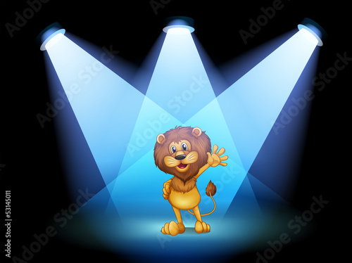 A stage with a lion waving in the middle