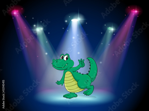 A crocodile dancing in the middle of the stage