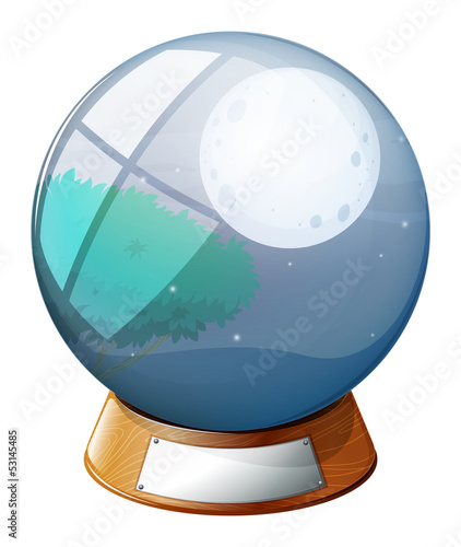 A crystal ball with an image of a full moon