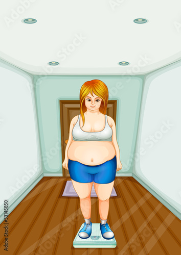 A fat girl standing on a weighing scale