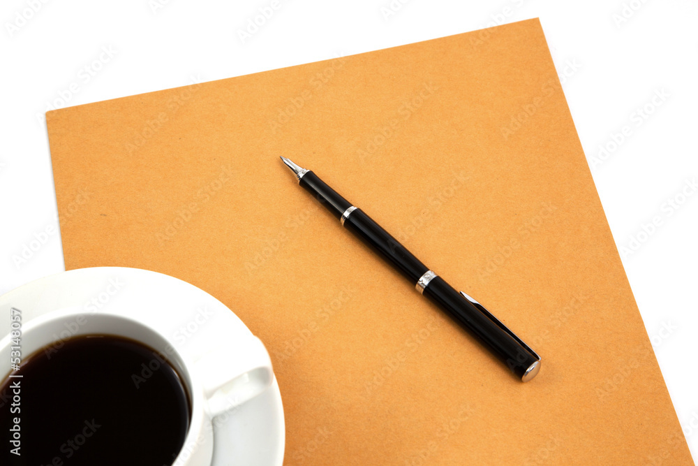 folder with coffee cup on table