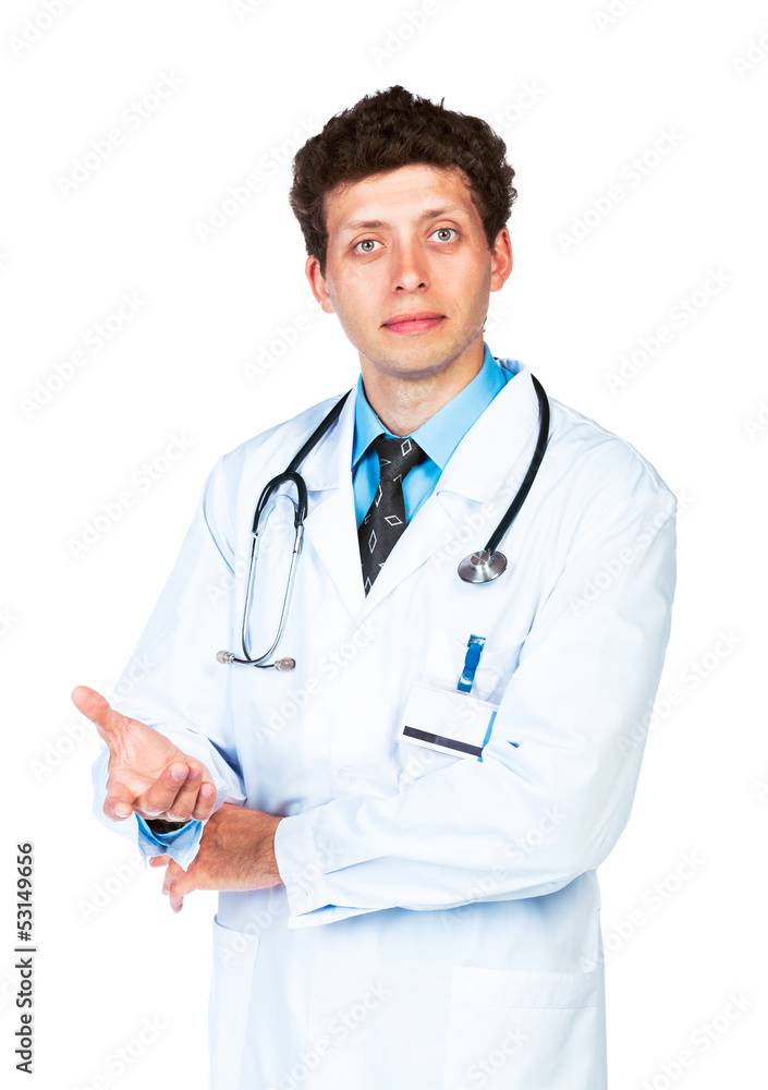 Portrait of a male doctor showing finger at you on white Portrait of a male doctor showing finger at you on white
