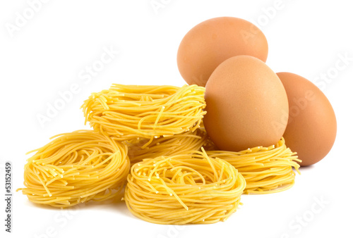 Italian egg pasta nest isolated on white background