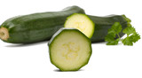 Cut fresh vegetable zucchini isolated on white background