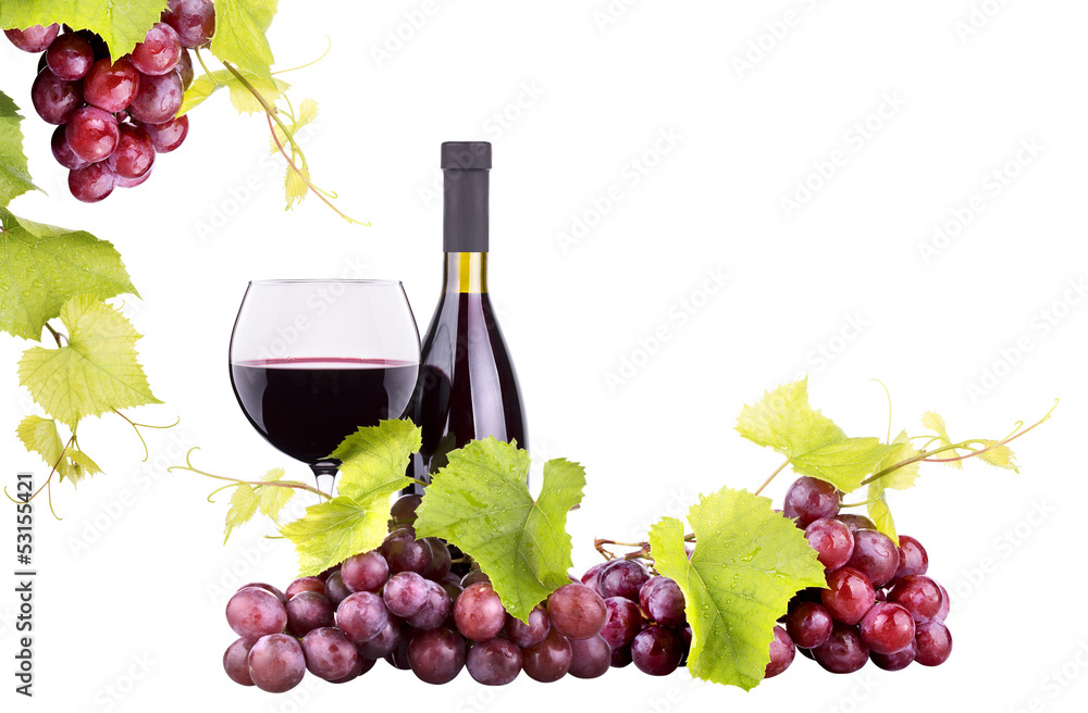 Ripe grapes, wine glass and bottle of wine
