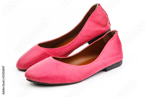 A pair of pink casual shoe on white background