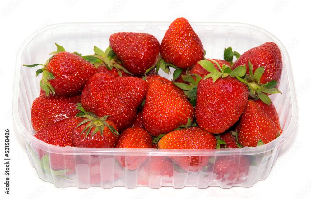 plastic tray with strawberries. plastic tray with strawberries.