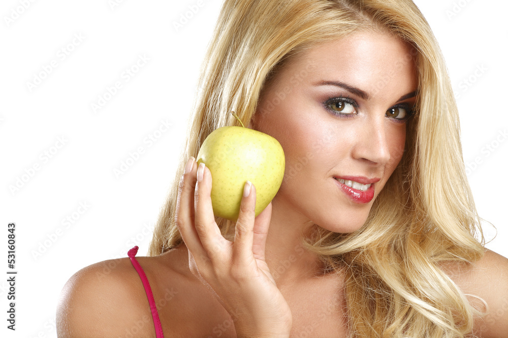 young happy beautiful girl eating a green apple young happy beautiful girl eating a green apple